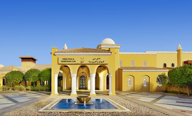 a building with a fountain in front of it