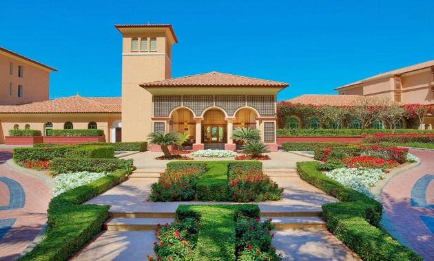 a wedding venue building with a garden