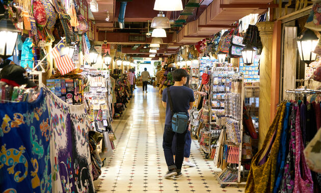 a man is roaming around in the bazar of dubai 