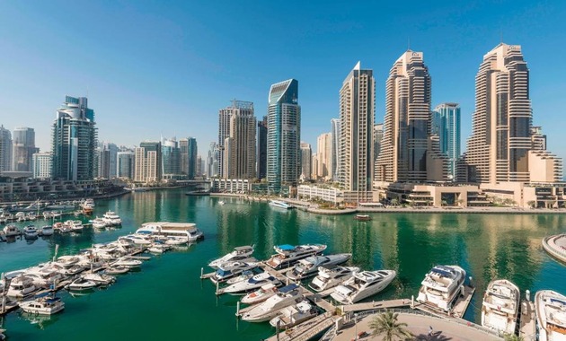 a city with boats in the water