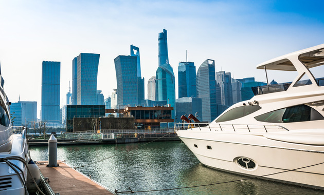 Dubai harbor with a beautiful skyline and a board