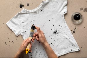 black ink stains on white t shirt