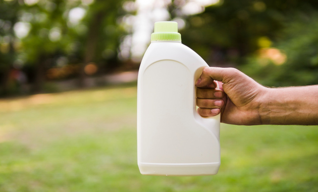 a bottle of bleach for removing ink stain