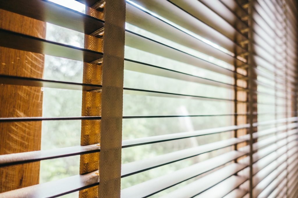 a picture of blinds and process to clean blinds
