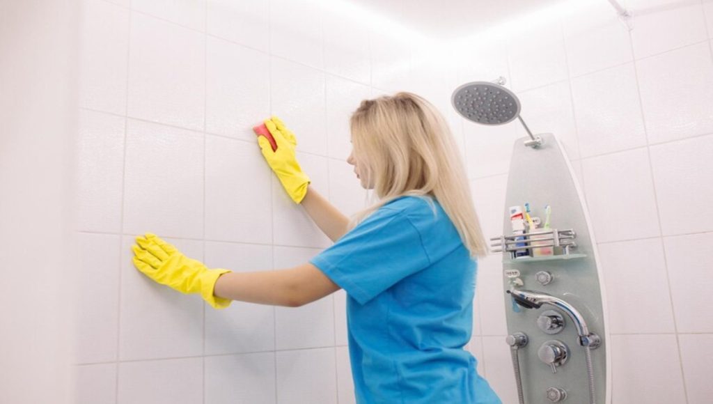 professionally cleaning bathroom tiles