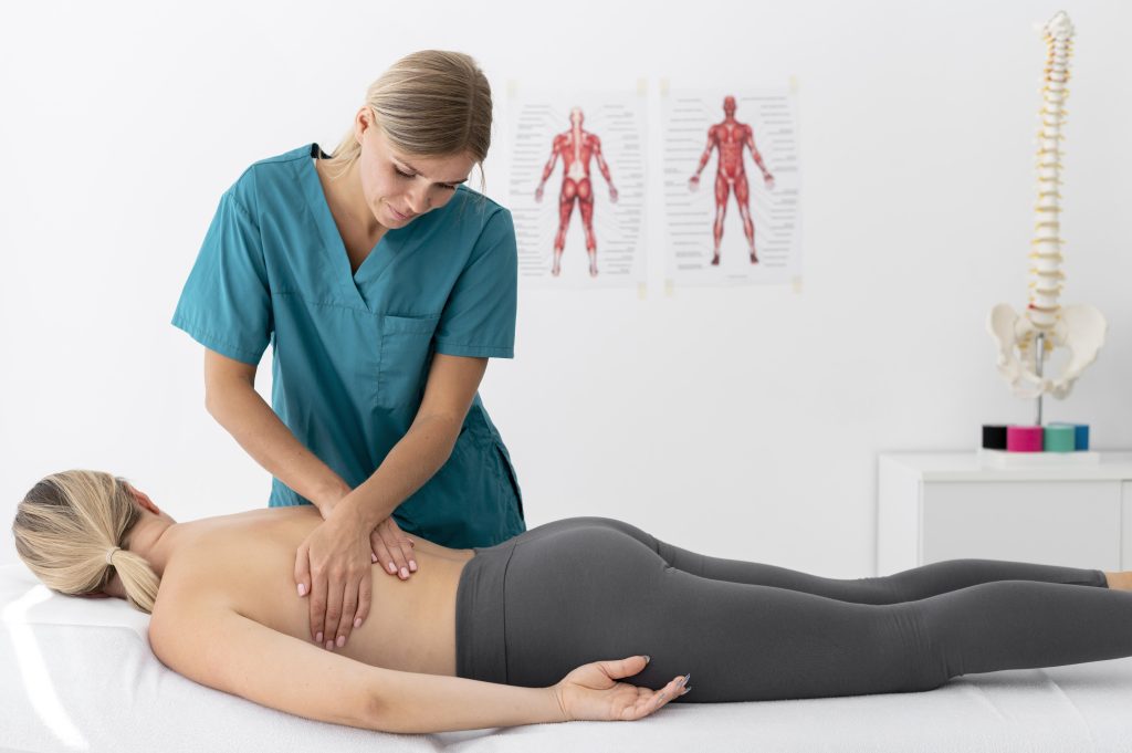 physiotherapist giving massage her patient